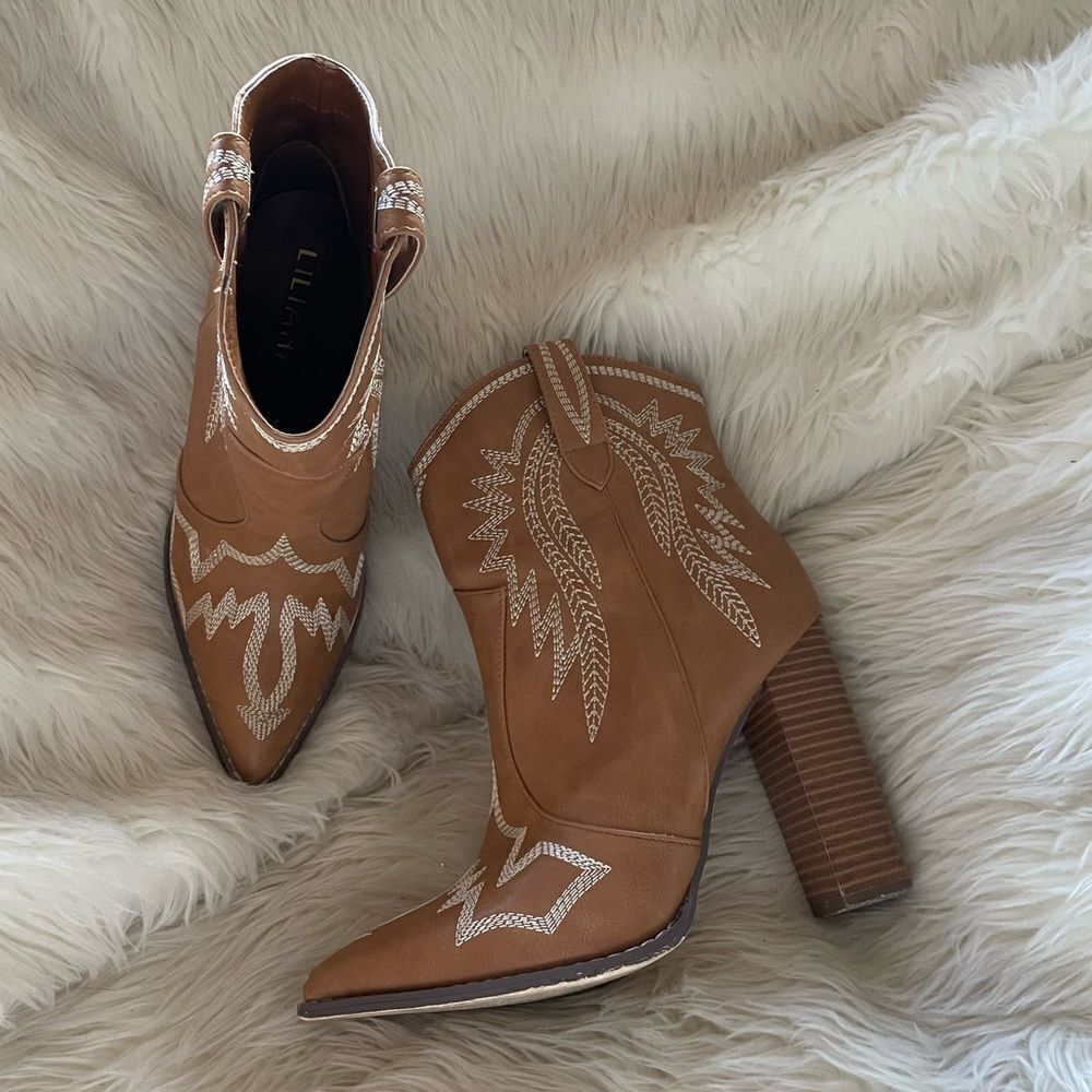 Tan heeled cowgirl boots